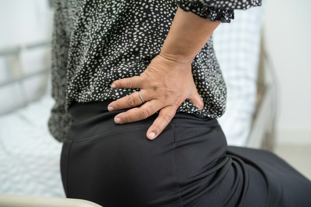 Primary Hip Replacement 5 asian lady patient wearing back pain support belt 2025 02 25 01 45 08 utc